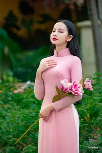 VGU No.158: Discover the Timeless Grace of Vietnamese Beauty in a Stunning Pink Ao Dai - image 9