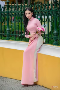 VGU No.158: Discover the Timeless Grace of Vietnamese Beauty in a Stunning Pink Ao Dai - image 3