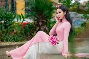 VGU No.158: Discover the Timeless Grace of Vietnamese Beauty in a Stunning Pink Ao Dai - image 6