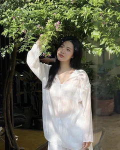 Vietnamese Liu Yifei Lookalike Stuns in Traditional Ao Dai and Conical Hat Photoshoot - image 2
