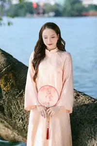 Elegant Vietnamese Beauty in Ao Dai by the Lake  A Glimpse of Hanoi's Serene Charm 1000025296 - image 0