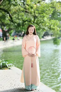 Elegant Vietnamese Beauty in Ao Dai by the Lake  A Glimpse of Hanoi's Serene Charm 1000025296 - image 7