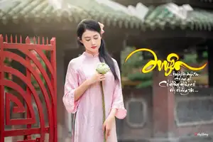 VGU No.163: The Graceful Beauty of a Vietnamese Girl in Traditional Pink Ao Dai Amidst Ancient Architecture - image 8