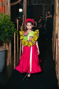 May A Makes a Stunning Fashion Runway Comeback After 17 Years - image 2