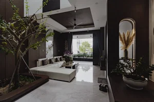 Modern 3-Story Townhouse Design: HH’s House in Da Nang Featuring Sustainable Greenery, Natural Light, and Open Voids for Contemporary Urban Living - image 0