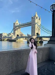 Elegant Pink Ao Dai at London's Tower Bridge: A Cultural Fusion - image 5
