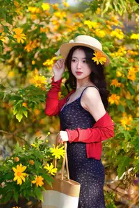Elegant Asian Girl Portrait with Golden Flowers in Afternoon Sun 1000024552 - image 0