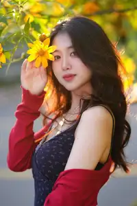 Elegant Asian Girl Portrait with Golden Flowers in Afternoon Sun 1000024552 - image 5