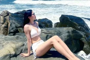 Quang Tri Volleyball Star stuns in Elegant White Bikini Gallery - image 3