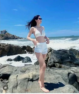 Quang Tri Volleyball Star stuns in Elegant White Bikini Gallery - image 7