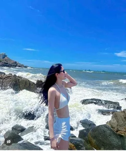 Quang Tri Volleyball Star stuns in Elegant White Bikini Gallery - image 2