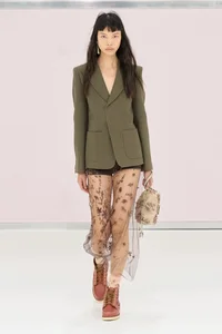 Italian Fashion Revolution: The Rise of Cone Bras and Perforated Dress Designs - image 19