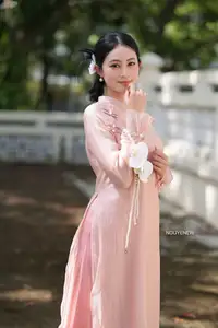 Timeless Beauty: Elegant Vietnamese Girl in Graceful Pink Ao Dai 1000024694 - image 12