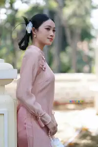 Timeless Beauty: Elegant Vietnamese Girl in Graceful Pink Ao Dai 1000024694 - image 5