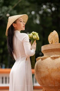 The Timeless Elegance of Vietnamese Ao Dai: Artistic Portraits by NAG Truong Nghia - image 1