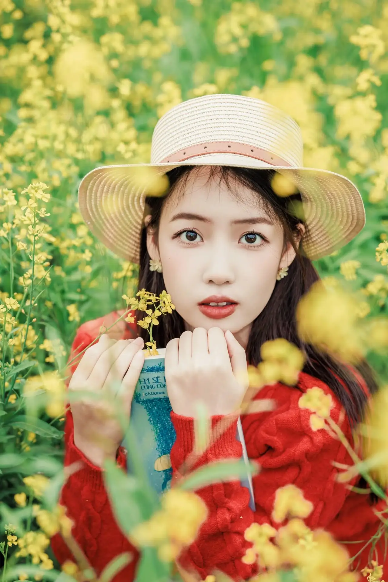 Gentle Beauty: A Girl in a Vibrant Rapeseed Flower Field, Spring Serenity