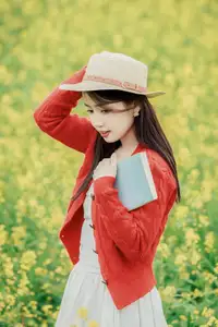 Gentle Beauty: A Girl in a Vibrant Rapeseed Flower Field, Spring Serenity - image 11