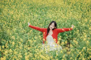 Gentle Beauty: A Girl in a Vibrant Rapeseed Flower Field, Spring Serenity - image 8