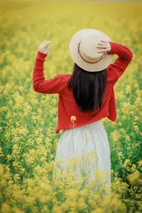 Gentle Beauty: A Girl in a Vibrant Rapeseed Flower Field, Spring Serenity - image 7
