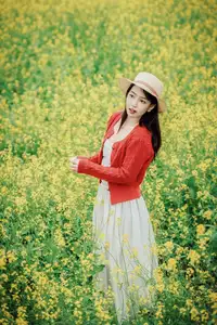Gentle Beauty: A Girl in a Vibrant Rapeseed Flower Field, Spring Serenity - image 4