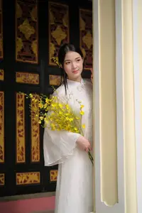 Vietnamese Beauty: Elegant Girl in White Ao Dai, Conical Hat with Yellow Flowers in Ancient Garden - image 7