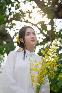 Vietnamese Beauty: Elegant Girl in White Ao Dai, Conical Hat with Yellow Flowers in Ancient Garden - image 4