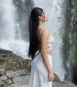 Stunning Waterfall Photoshoot: Hot Girl Showcases Ethereal Fashion and Natural Beauty Outdoors - image 8