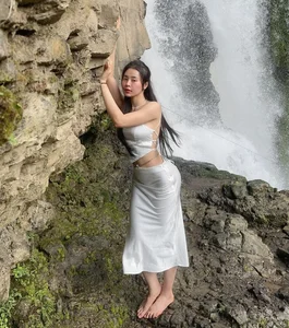 Stunning Waterfall Photoshoot: Hot Girl Showcases Ethereal Fashion and Natural Beauty Outdoors - image 3