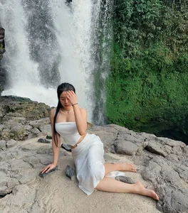 Stunning Waterfall Photoshoot: Hot Girl Showcases Ethereal Fashion and Natural Beauty Outdoors - image 5