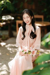 Poetic Beauty in Pink Ao Dai and White Lilies - image 10
