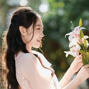 Poetic Beauty in Pink Ao Dai and White Lilies - image 11