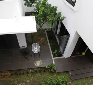 6 Inspiring Modern Townhouse Designs Featuring Lush Indoor Gardens, Natural Light, and Sustainable Biophilic Architecture for a Refreshing Urban Oasis - image 15