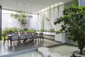 6 Inspiring Modern Townhouse Designs Featuring Lush Indoor Gardens, Natural Light, and Sustainable Biophilic Architecture for a Refreshing Urban Oasis - image 23