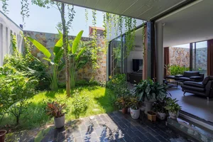 6 Inspiring Modern Townhouse Designs Featuring Lush Indoor Gardens, Natural Light, and Sustainable Biophilic Architecture for a Refreshing Urban Oasis - image 20