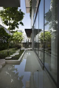 6 Inspiring Modern Townhouse Designs Featuring Lush Indoor Gardens, Natural Light, and Sustainable Biophilic Architecture for a Refreshing Urban Oasis - image 34