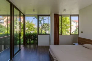 6 Inspiring Modern Townhouse Designs Featuring Lush Indoor Gardens, Natural Light, and Sustainable Biophilic Architecture for a Refreshing Urban Oasis - image 31
