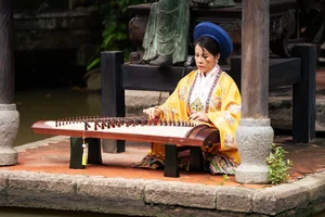Vu Thu Phuong and Stars Celebrate the Timeless Beauty of the Vietnamese Ao Dai - image 7