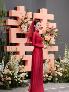 Midu's Elegant Wedding: 39 Custom Ao Dai Sets Worth Nearly 300 Million VND - image 5