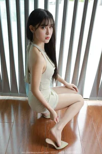 Chic Fashion Gallery: Xiaobao Features a Stunning Halter Neck Bodycon Dress in Latest IESS Collection - image 10