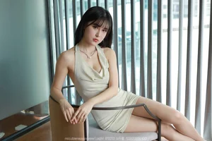Chic Fashion Gallery: Xiaobao Features a Stunning Halter Neck Bodycon Dress in Latest IESS Collection - image 1