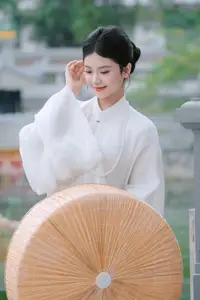 Pure Beauty: Girl in White with Orchids - Grace and Serenity of East Asian Charm - image 0
