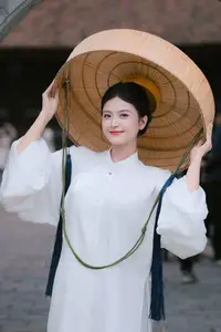 Pure Beauty: Girl in White with Orchids - Grace and Serenity of East Asian Charm - image 2