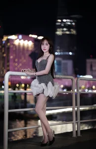 Billiards Goddess Captivates Fans with Luxurious Photoshoot by the Scenic Saigon River - image 8
