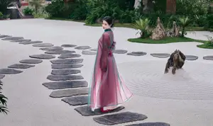Graceful East Asian Beauty: Traditional Charm in a Lush Green Garden - image 15