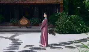 Graceful East Asian Beauty: Traditional Charm in a Lush Green Garden - image 1