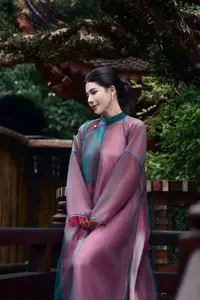 Graceful East Asian Beauty: Traditional Charm in a Lush Green Garden - image 10