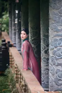 Graceful East Asian Beauty: Traditional Charm in a Lush Green Garden - image 3