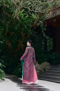 Graceful East Asian Beauty: Traditional Charm in a Lush Green Garden - image 11