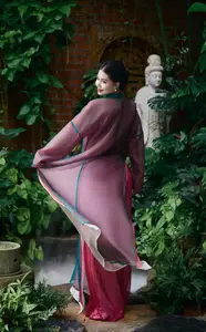 Graceful East Asian Beauty: Traditional Charm in a Lush Green Garden - image 2