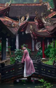 Graceful East Asian Beauty: Traditional Charm in a Lush Green Garden - image 7